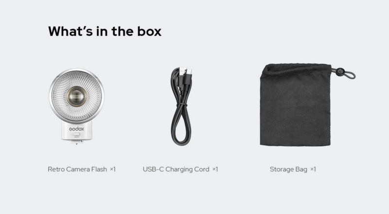 Three items displayed: a Godox retro camera flash with reflector, a USB-C charging cable, and a black storage pouch.