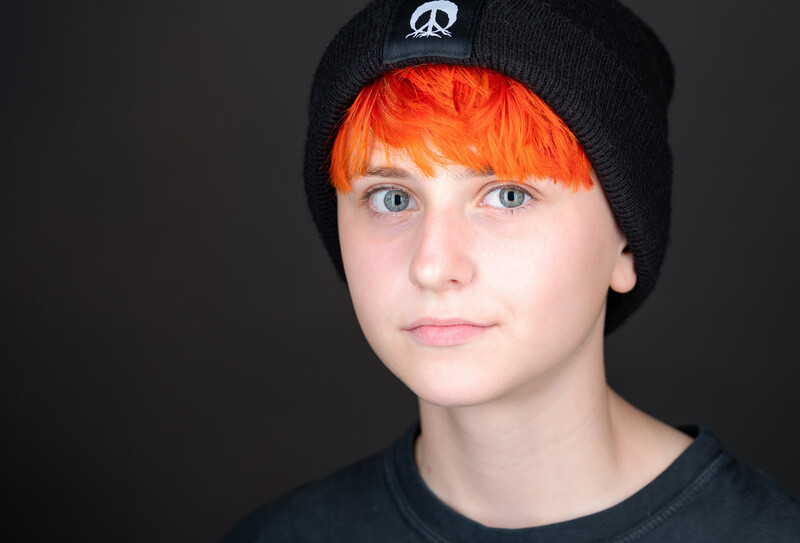 Studio lighting practice, person with a hat