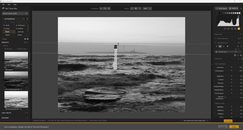 Screenshot of black and white ocean waves in photo editing software with crop overlay and histogram visible.