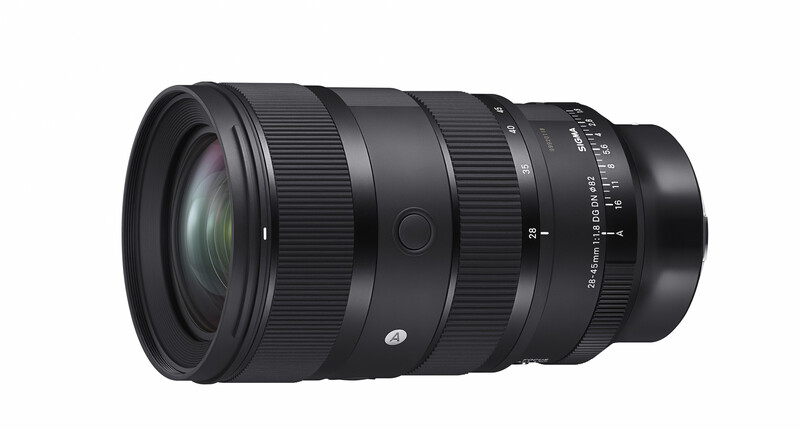 Black telephoto lens with ribbed focus ring and distance scale markings against white background.