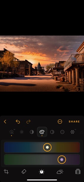 Screenshot of mobile photo editing interface showing sunset street scene with editing tools and color grading panel visible.