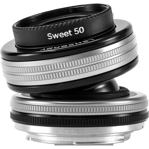 Stacked lens elements showing the Lensbaby Sweet 50 selective focus lens in black and silver.