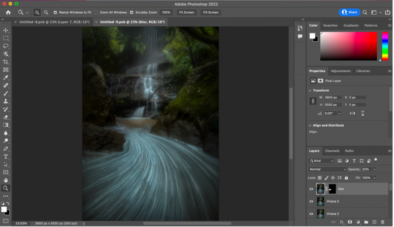 Screenshot of Adobe Photoshop 2022 with a long-exposure waterfall landscape image open for editing.