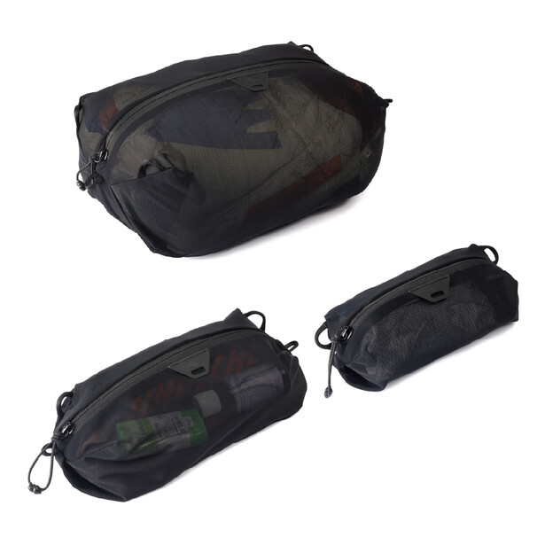 Three black mesh camera bags in different sizes arranged in a product display.