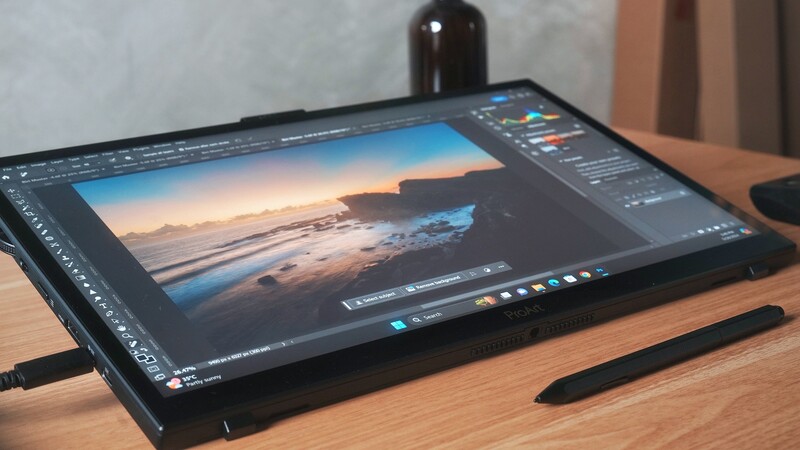 Screenshot of photo editing software displaying a coastal sunrise image with adjustment panels visible on the right side.