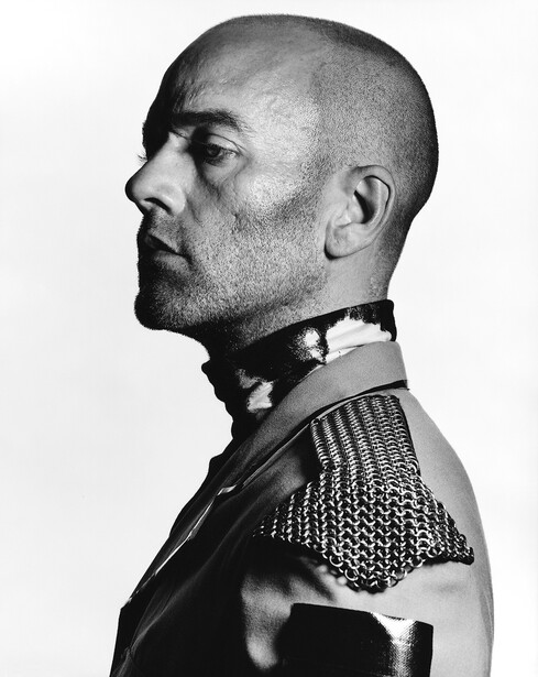 Profile portrait of a man in military uniform with ornate shoulder details and formal collar.
