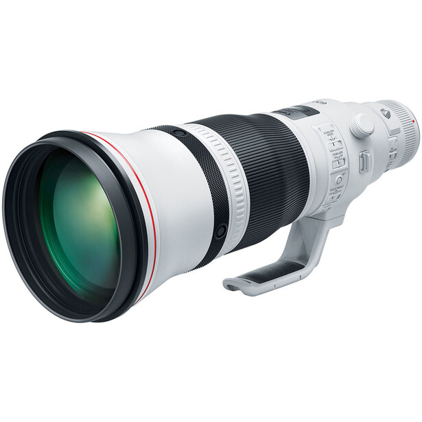 White telephoto zoom lens with green-coated optics and focus ring against white background.