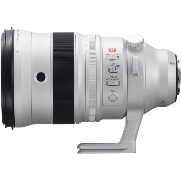 White telephoto lens with black focus ring and control switches mounted on a tripod foot.