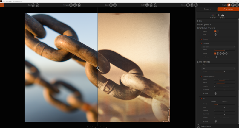 Weathered metal chain links in close-up, captured in warm golden hour light with selective focus.