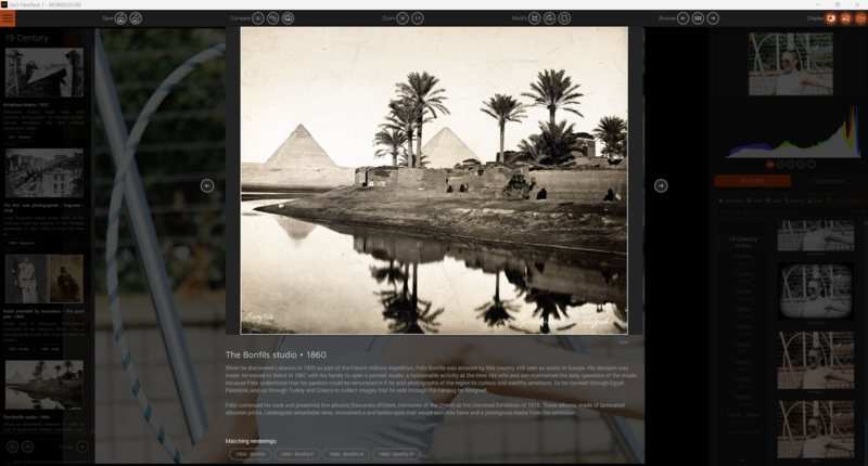 Pyramids and palm trees reflected in a still waterway, sepia-toned historical photograph.