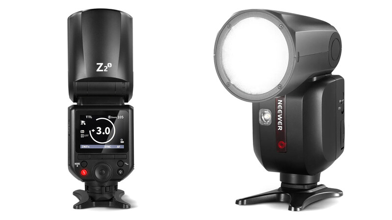 Two external camera flash units displayed side by side against a white background.