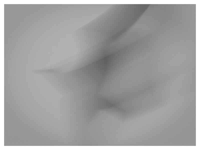 Close-up of human skin with soft, diffused lighting creating subtle shadows and highlights.