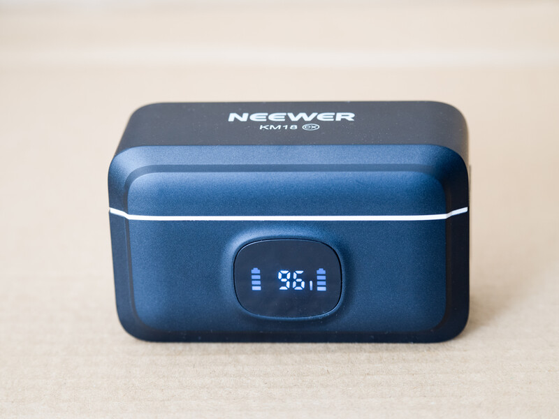 Neewer portable power station with blue finish and digital display showing 98% battery level.