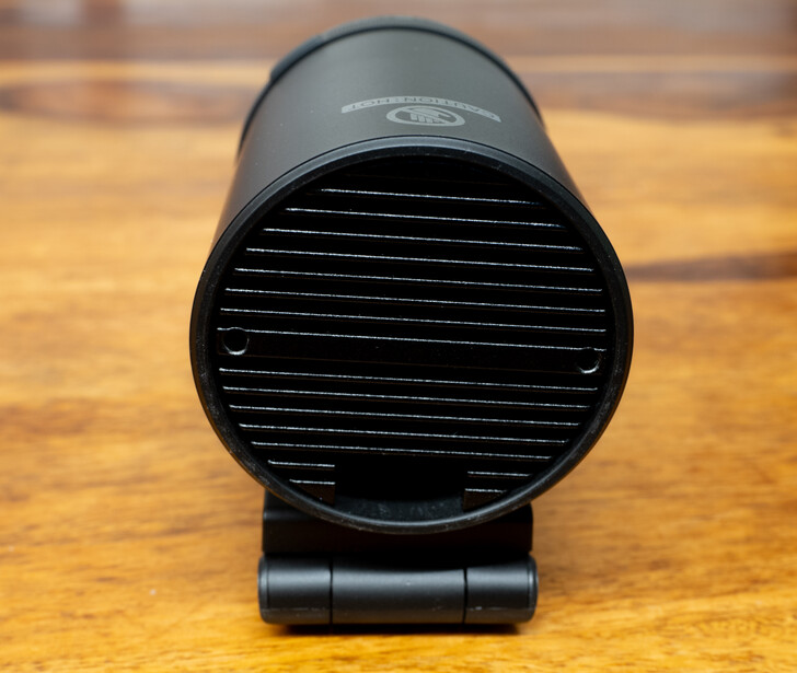 Black cylindrical lens hood with horizontal vents and mounting bracket viewed head-on from above.