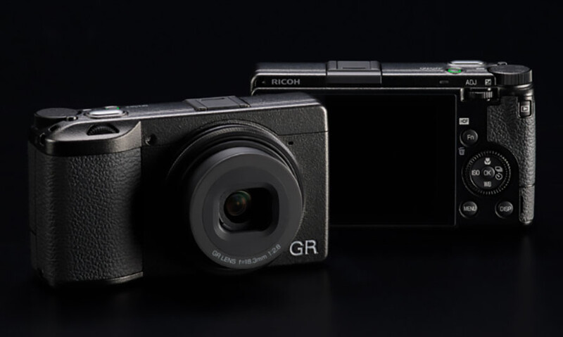 Ricoh GR compact camera shown from front and rear angles against a black background.