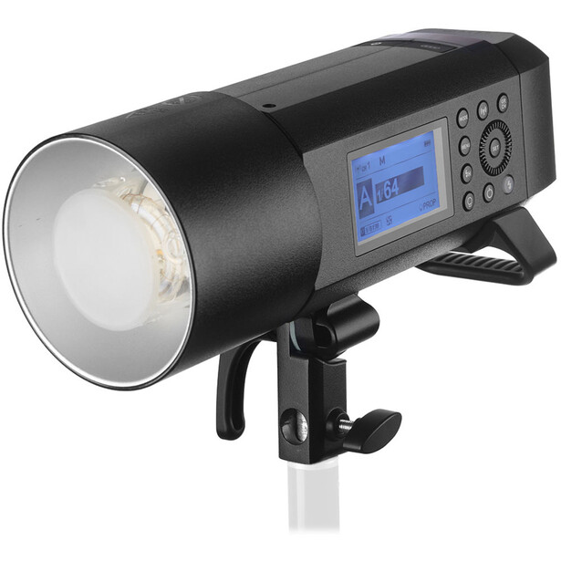 Portable LED flash unit with digital control panel and reflector attachment mounted on stand.