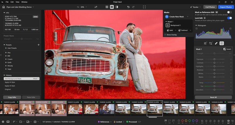 Bride and groom posing on a vintage truck against a vibrant red background.