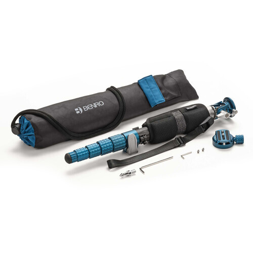 Camera lens cleaning kit with brush, air blower, and carrying case displayed on white background.