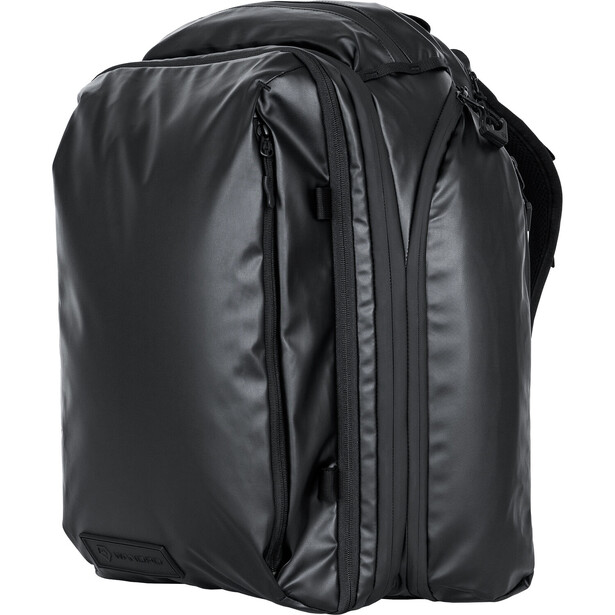 Black convertible camera backpack with multiple compartments and shoulder straps displayed against white background.