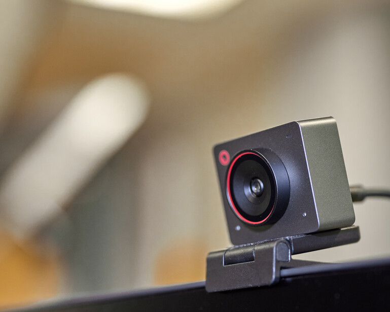 The OBSBOT Meet 2 mounted to a monitor