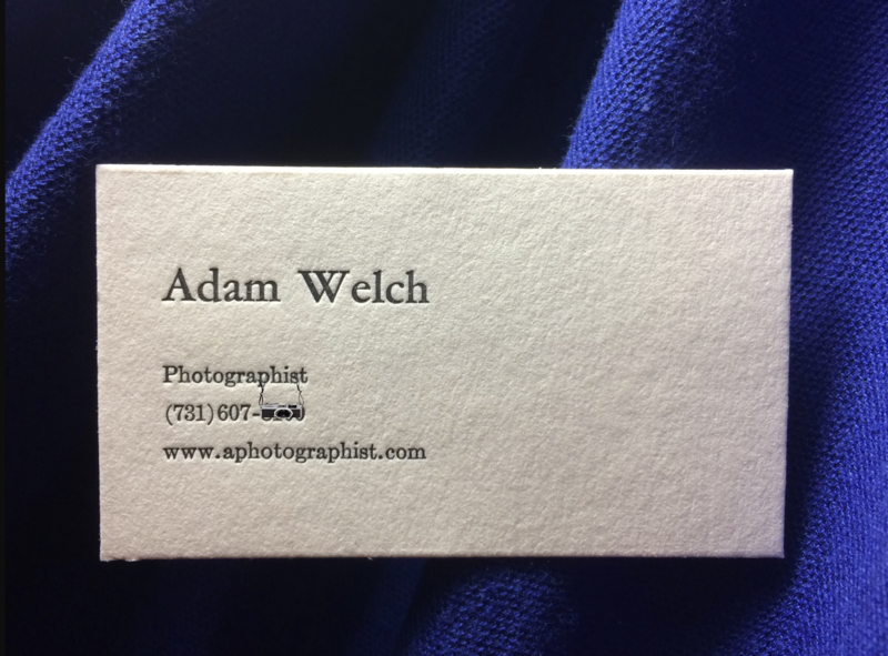 Business card for Adam Welch, Photographist, with contact information on cream cardstock.