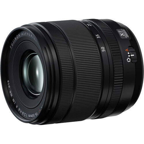 Black zoom lens with focus and aperture rings displayed against a neutral background.