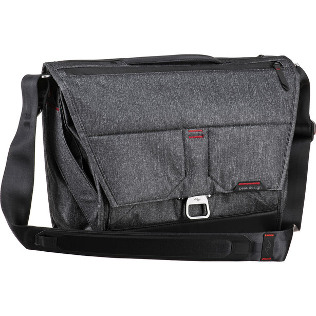 Gray messenger bag with black accents and shoulder strap, featuring front pockets and buckle closure.