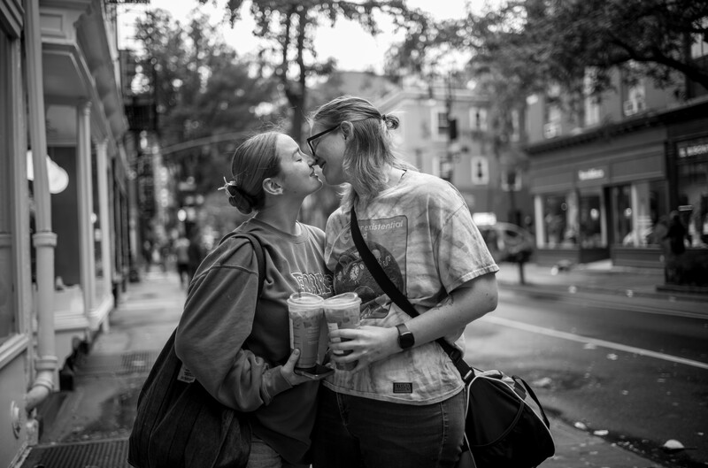 Couple kissing on the street