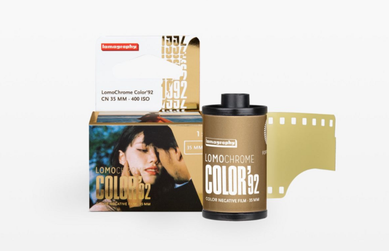 Lomochrome Color 35mm film box and canister displayed with film strip and product packaging.