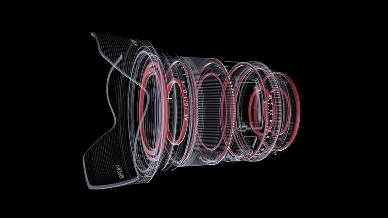 Cutaway illustration of a camera lens showing internal optical elements and mechanical components.