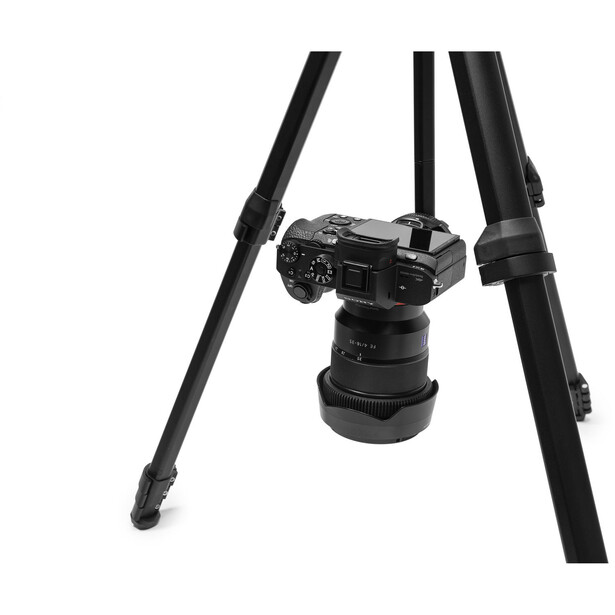 Professional video tripod with fluid head and telescoping legs against white background.