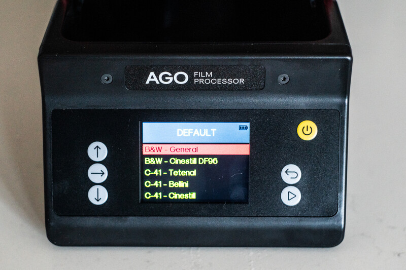 AGO Film Processor device with display screen showing film type options and processing modes.