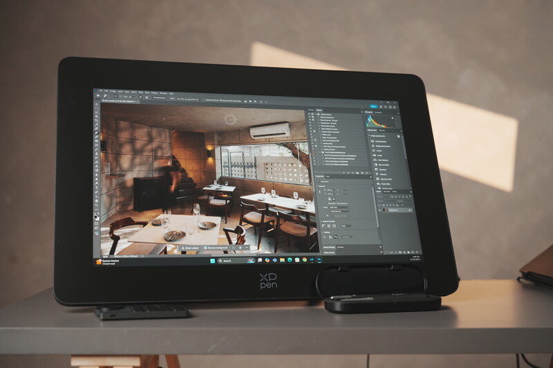 XP Pen monitor displaying an interior photograph in Adobe Lightroom with editing panels visible on the right side.