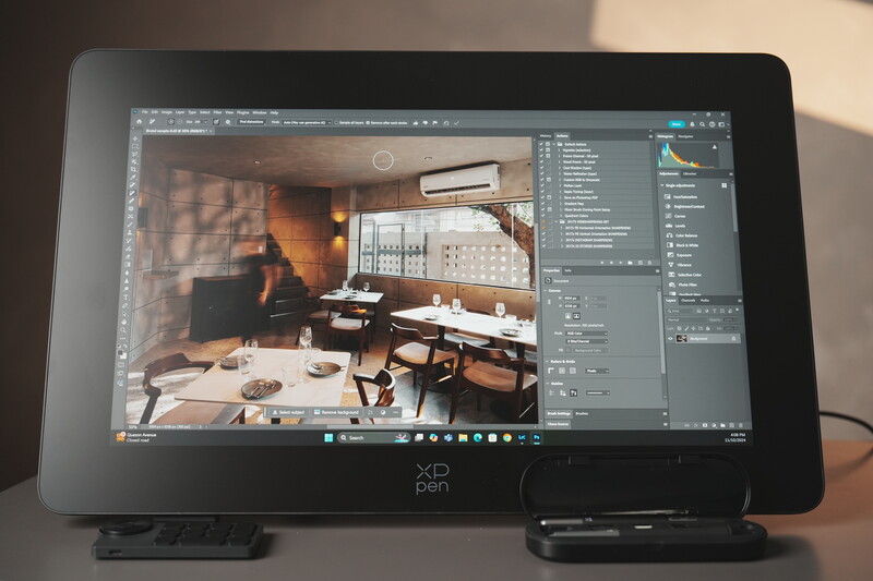 Screenshot of photo editing software displaying an interior room photograph with editing panels visible on the right side.