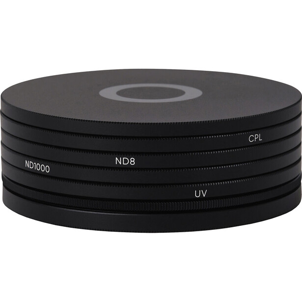 Stack of camera lens filters showing ND1000, ND8, CPL, and UV filters arranged in a pile.