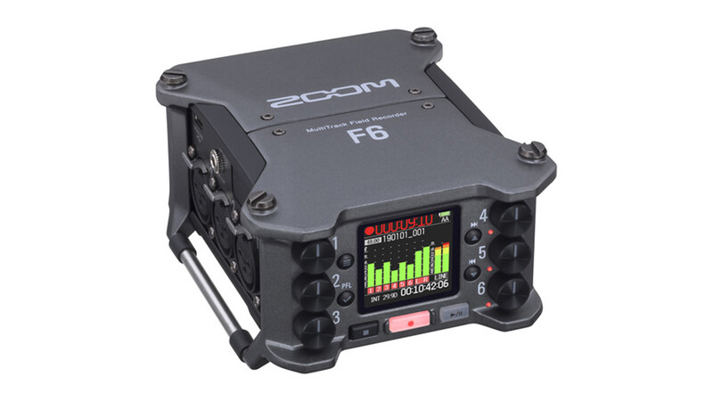 Zoom F8 portable field recorder with compact rectangular design and LCD display showing audio levels.