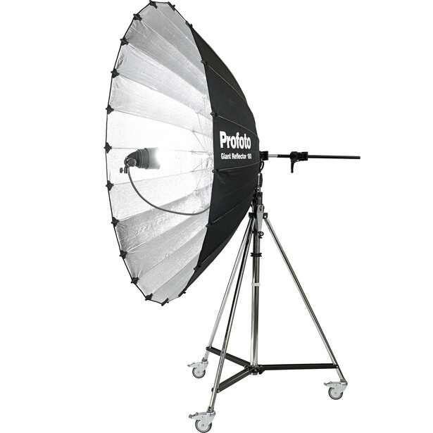 Profoto studio light with large parabolic softbox mounted on rolling tripod stand.