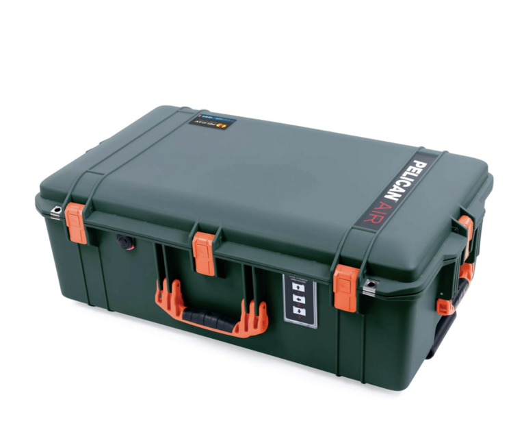 Hard-sided protective equipment case with dark green exterior, orange handles and latches, and customizable foam interior.