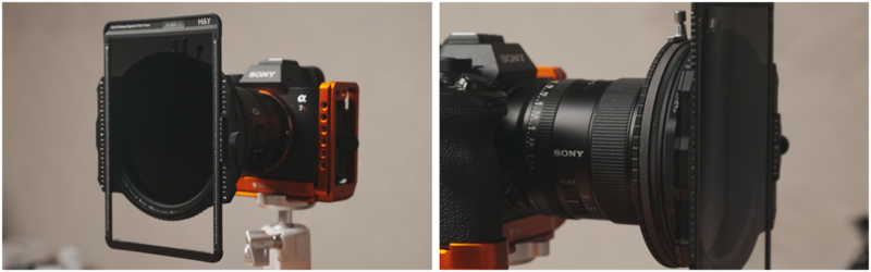 Sony camera with orange cage rig and matte box filter system mounted on tripod.
