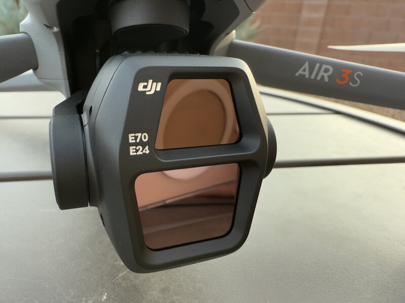 DJI Air 3S camera gimbal with E70 and E24 lens markings visible on the thermal imaging unit.