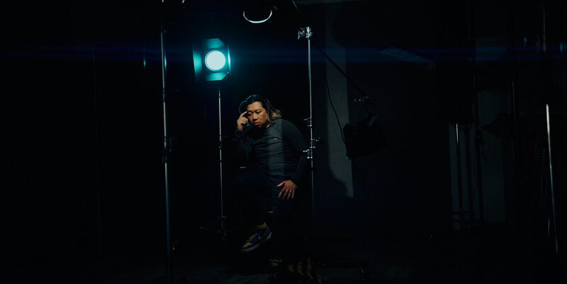 A portrait of photographer Danh Nguyen taken with the Viltrox 75mm EPIC lens