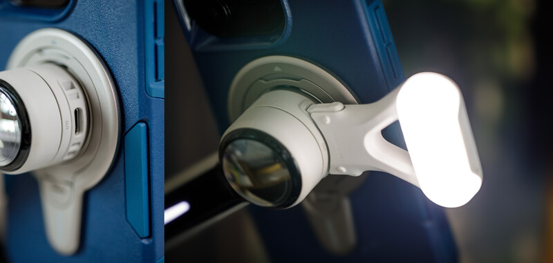Close-up comparison of two white camera-mounted lights on blue and dark camera bodies, showing design differences.