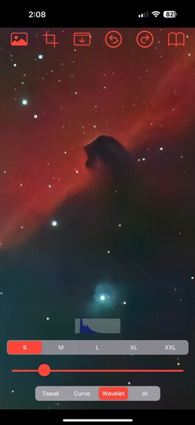 Screenshot of astrophotography editing interface with Horsehead Nebula region displayed in deep reds and blues.