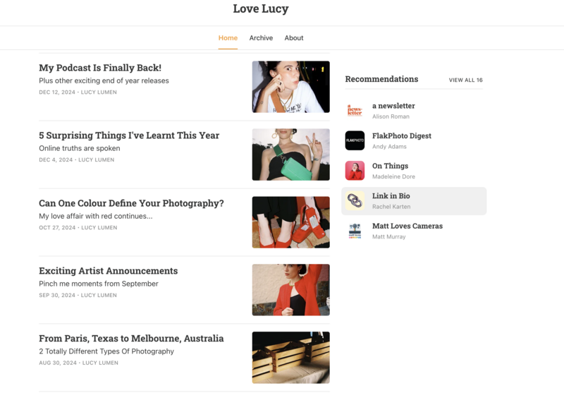 Screenshot of Love Lucy blog homepage displaying article titles and featured images in a two-column layout.
