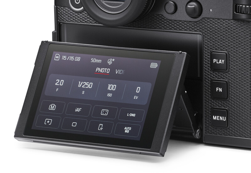 Mirrorless camera with articulating touchscreen displaying exposure settings in photo mode.