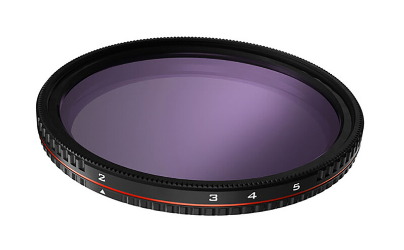 Graduated neutral density filter with numbered adjustment dial and purple-tinted glass.