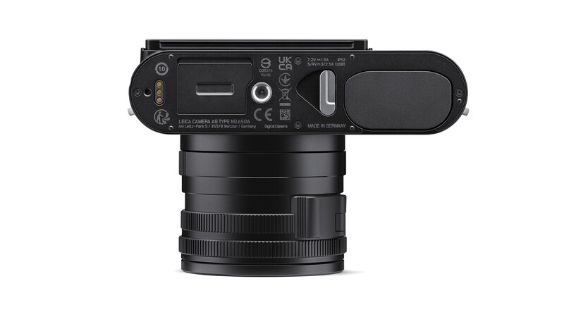 Top-down view of a rangefinder camera body with attached lens showing controls and aperture rings.