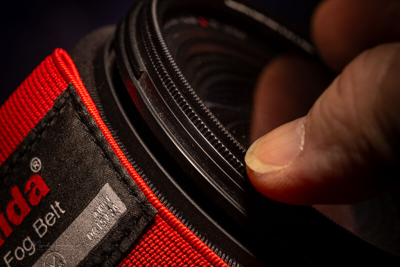 Rotate the filter to get the direction of the starburst spikes in the desired direction.