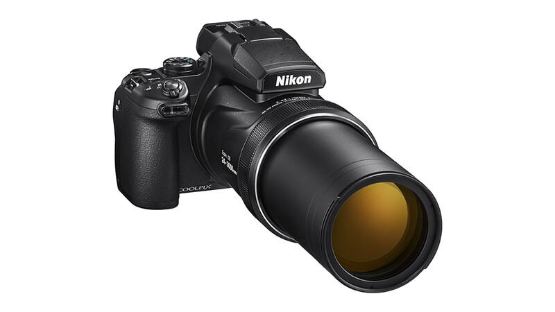 Nikon Coolpix P1000 compact camera with extended telephoto lens and articulating flash.