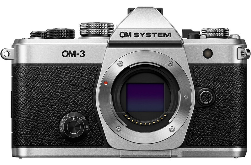OM System OM-3 film camera body shown from front, displaying silver top plate and black textured grip panels.